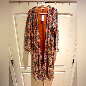 Triangular pattern sequin duster from Blanka Boutique, size L